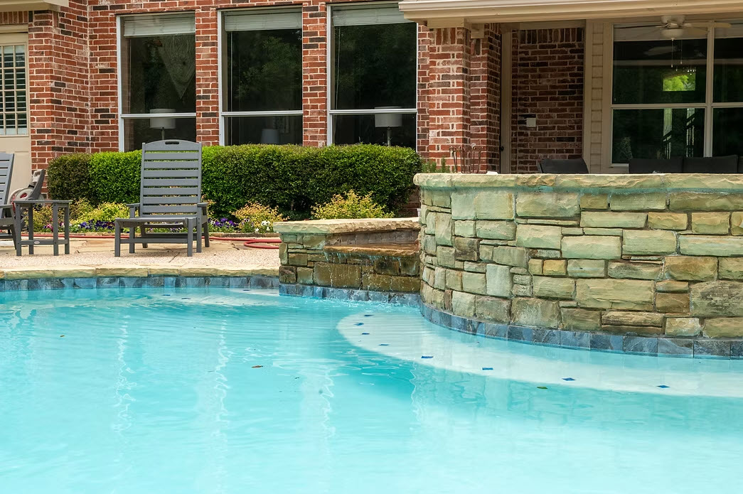 Raised spa with spillover in Prosper TX